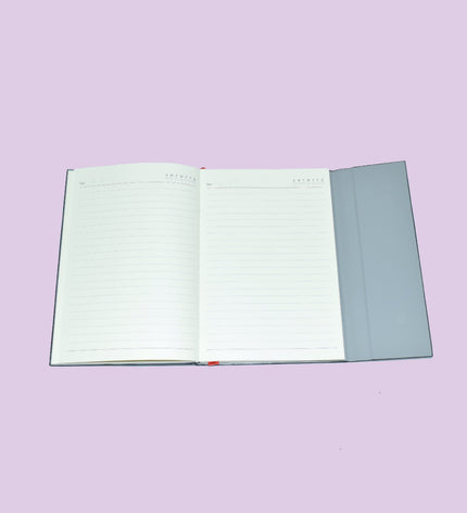 Open notebook with lined pages on a purple background
