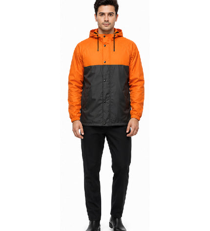 Man wearing an orange and black jacket on a white background