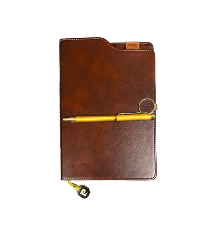 Brown leather notebook with a gold pen on a white background