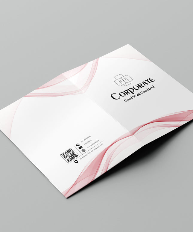 White business card with pink design elements on a gray background