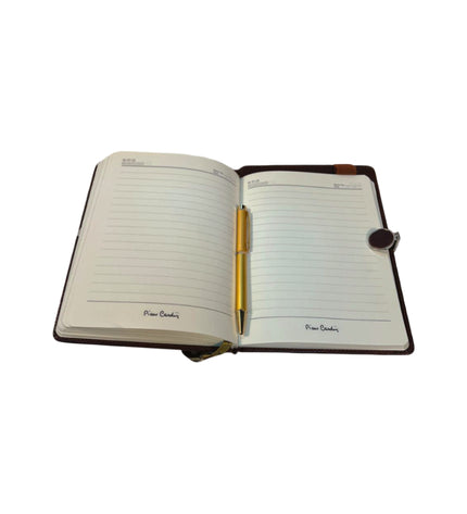 Open notebook with a pen on a white background
