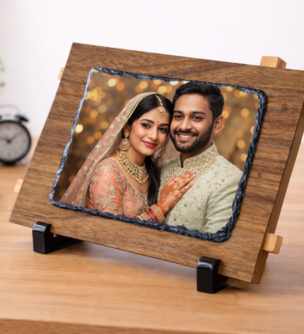 Wooden photo frame with a couple's portrait on a desk
