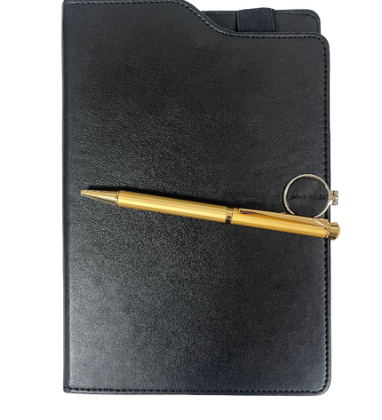 Black leather notebook with a gold pen on a white background