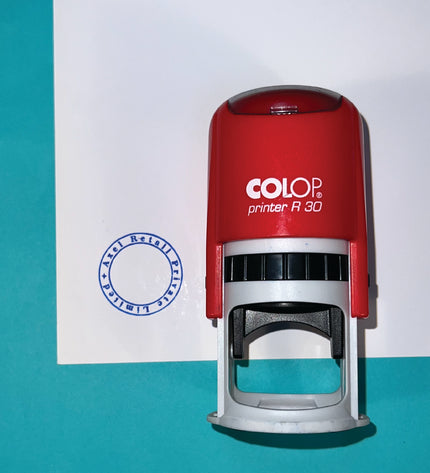 Red Colop printer A30 stamp on a green and white background