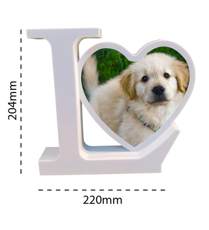 Heart-shaped photo frame with a dog inside, showing dimensions on a white background