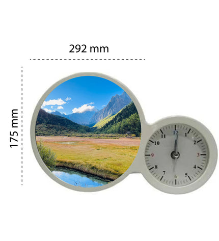 Clock with a scenic view of mountains and a lake, showing measurements on a white background.